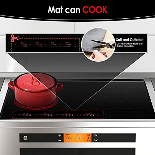 Red pot on induction stove with protective mat overlay.