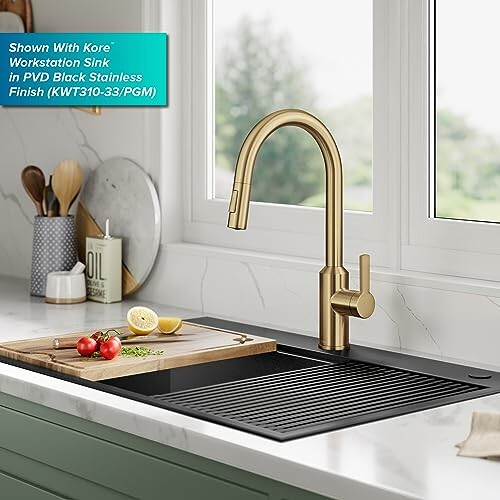 Kitchen sink with gold faucet and cutting board