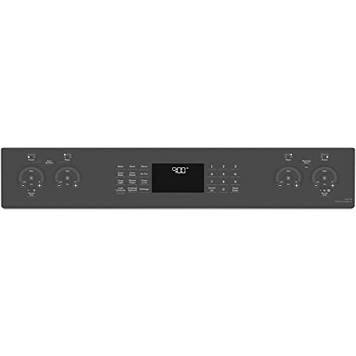 Black oven control panel with knobs and digital display