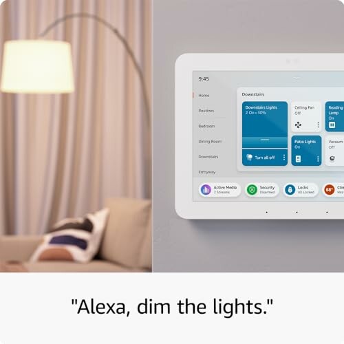 Smart home control panel on wall next to a lamp.