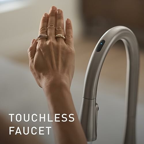 Hand activating touchless faucet